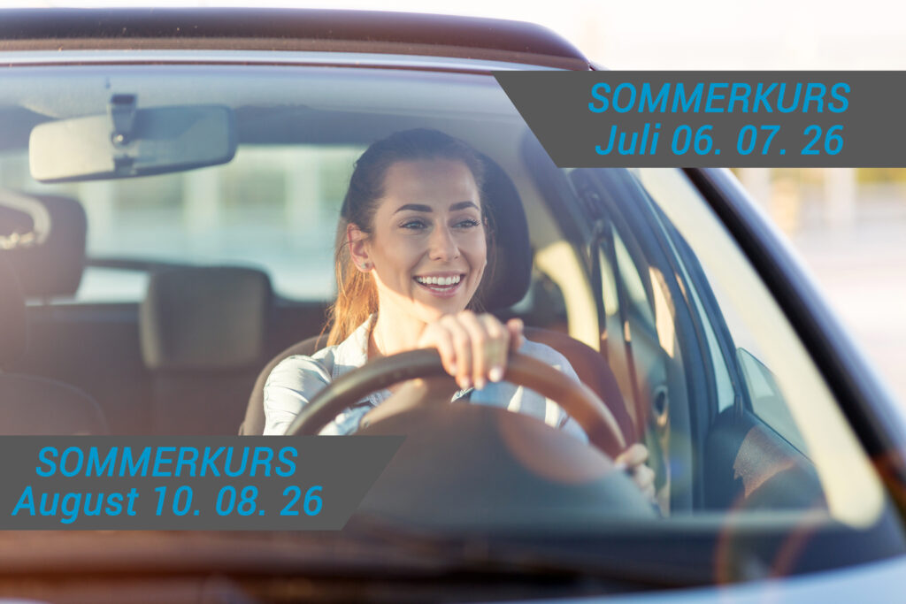 Happy woman driving a car and smiling